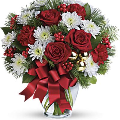 So very merry! Spread holiday cheer far and near with this festive mix of classic Christmas roses, winter forest greens and sparkling golden ornaments.
 

This festive mix includes red roses, white cushion spray chrysanthemums, red carnations, white pine, douglas fir, lemon leaf, red berries and gold ornament balls. Delivered in a glass vase adorned with red ribbon.